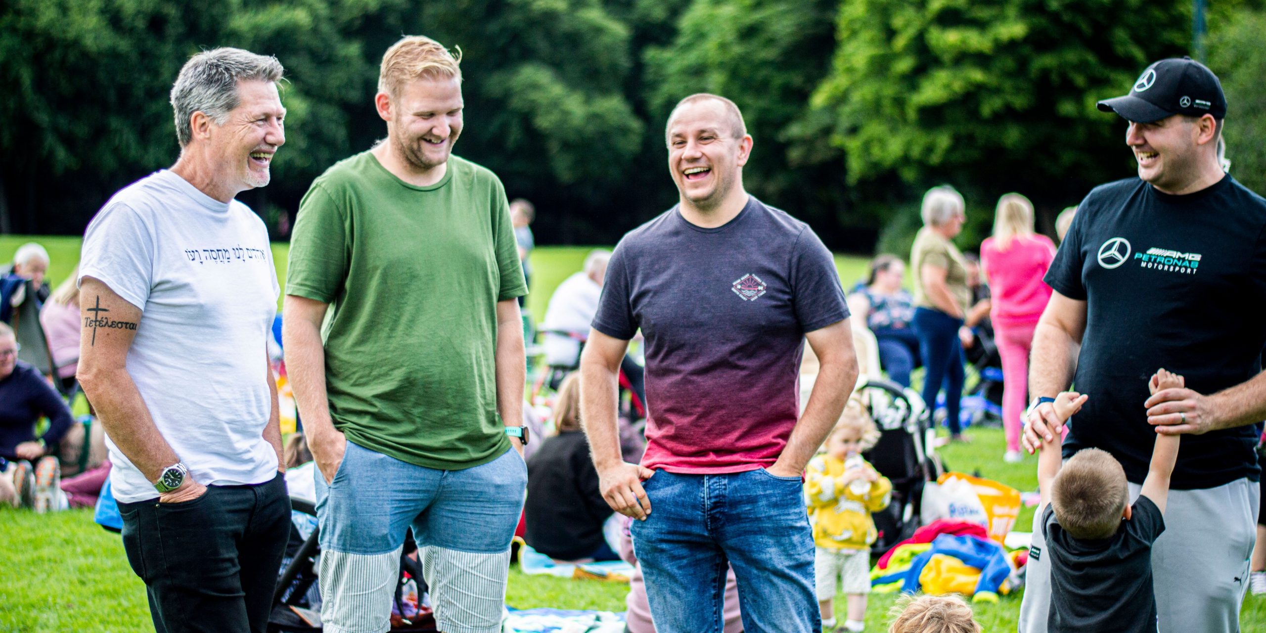 a group of men laughing