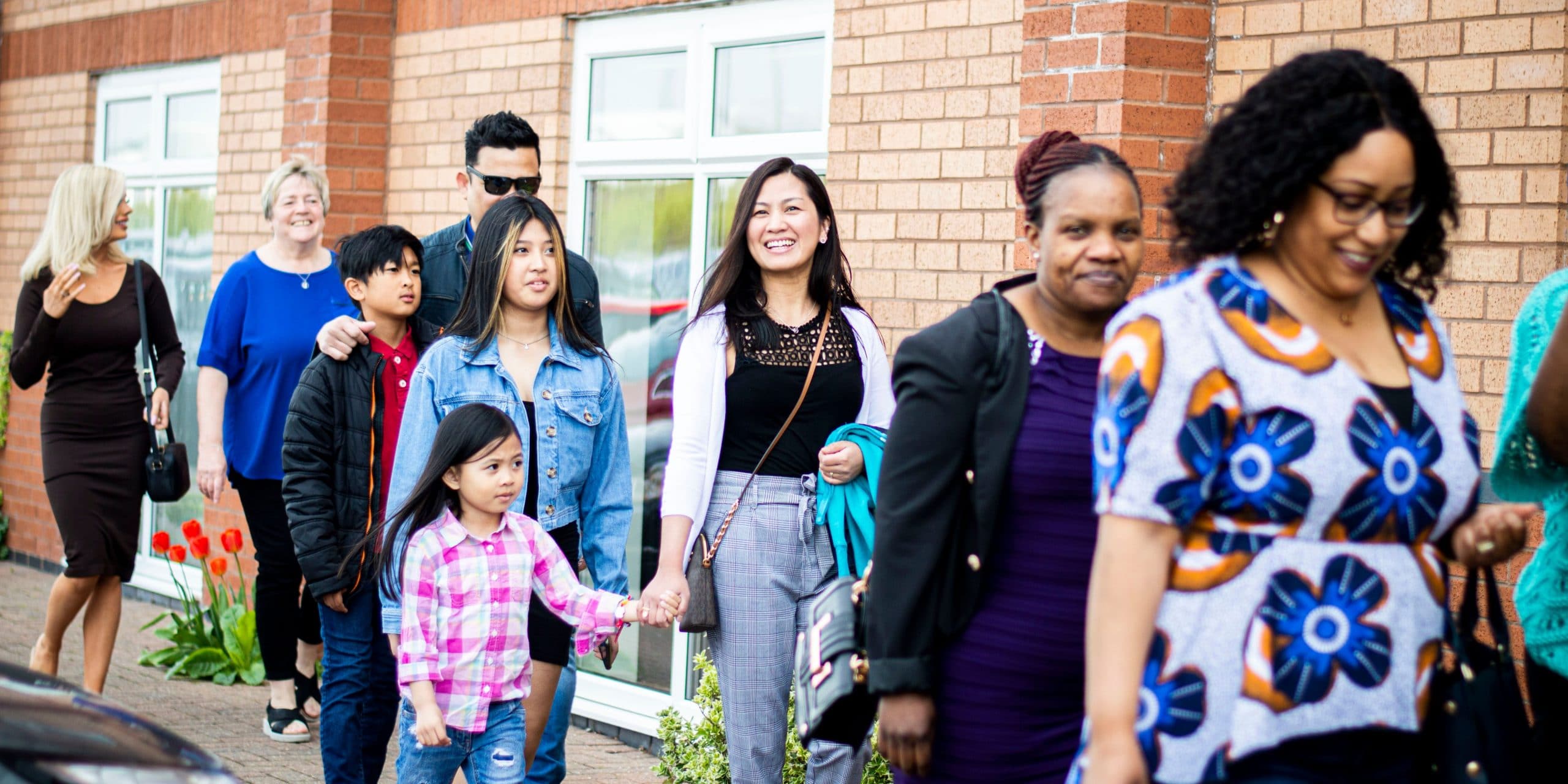 a group arriving at church