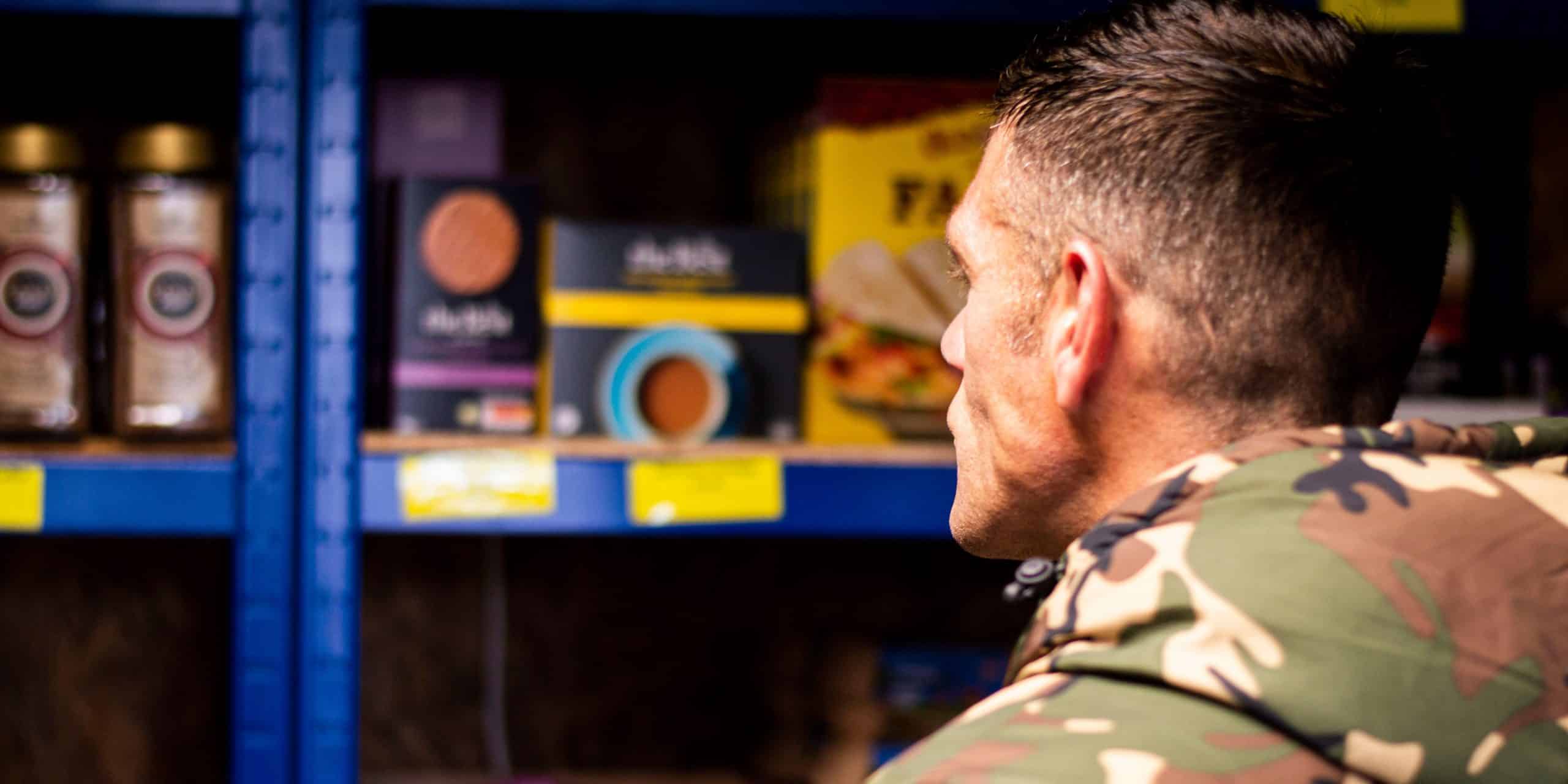 a man browsing shop shelves