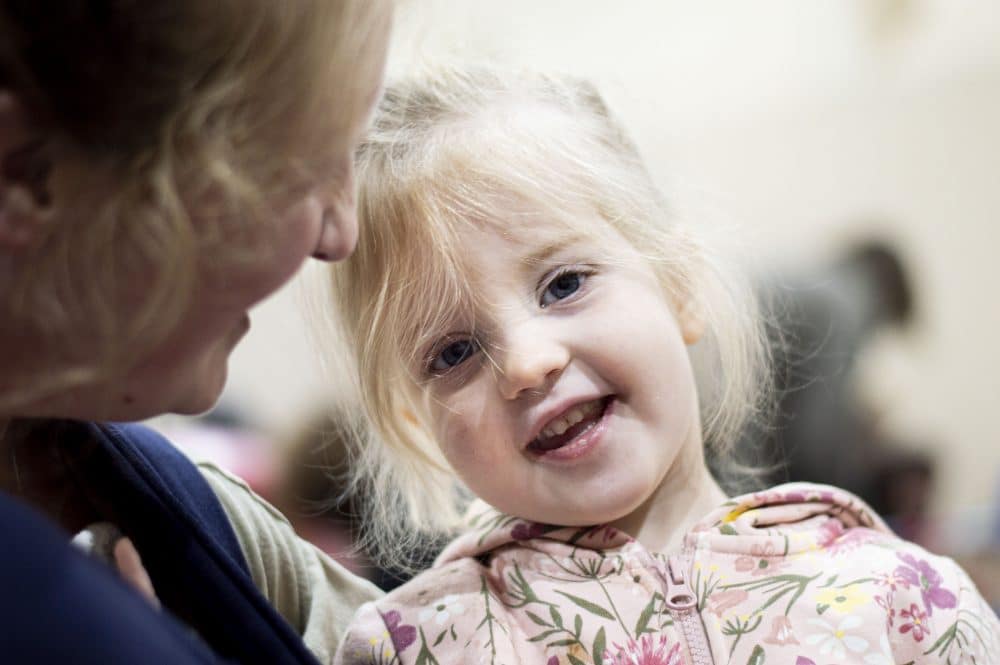 a toddler smiling